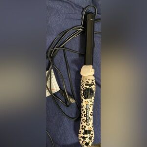 The BEACHWAVER ROTATING Electronic Leopard Print Hair Curling Iron Went Viral